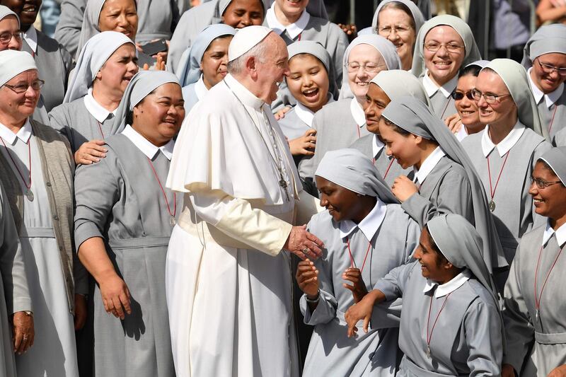 Pope Francis is greeted by nuns during his weekly general audience in the Vatican's Saint Peter square. AFP