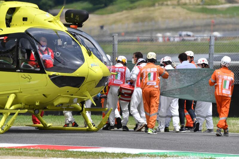 Medical officers evacuate Swiss Moto3 rider Jason Dupasquier after a crash during a qualifying session of the Italian Grand Prix at the Mugello race track on Saturday. Dupasquier later succumbed to his injuries on Sunday. AFP
