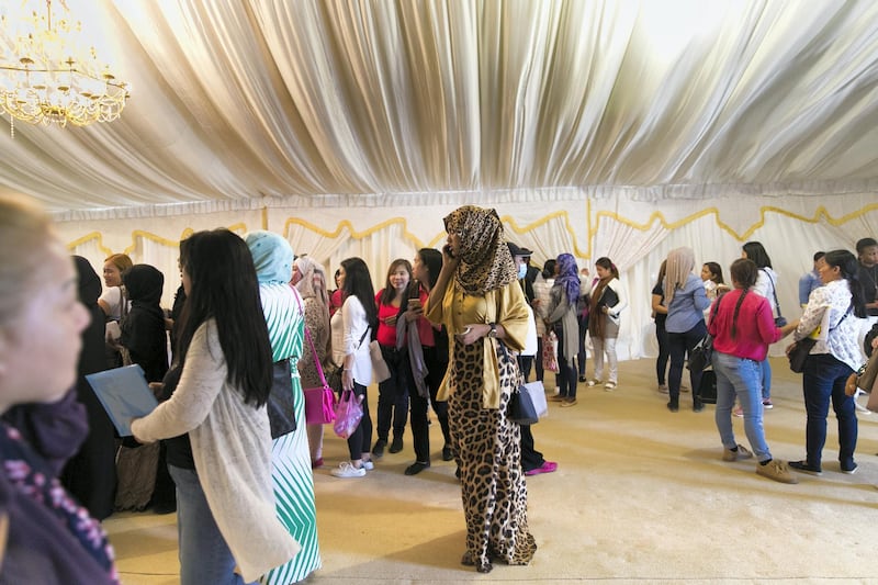 ABU DHABI, UNITED ARAB EMIRATES - AUGUST 5, 2018. 

Amnesty seekers at the Al Shahama immigration centre in Abu Dhabi.

Thousands of undocumented workers streamed into the center today as they sought to take advantage of the government's new amnesty law. 
 
(Photo by Reem Mohammed/The National)

Reporter: Anna Zacharias
Section:  NA