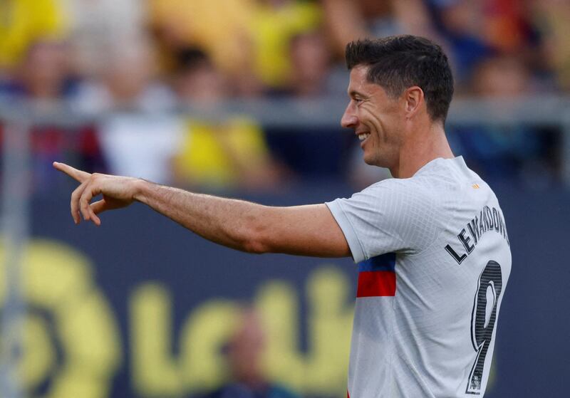 Robert Lewandowski celebrates scoring Barca's second goal. Reuters