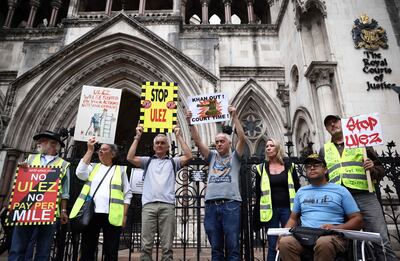 Demonstrators protest against the expansion of Ulez outside the High Court on Friday. AFP 