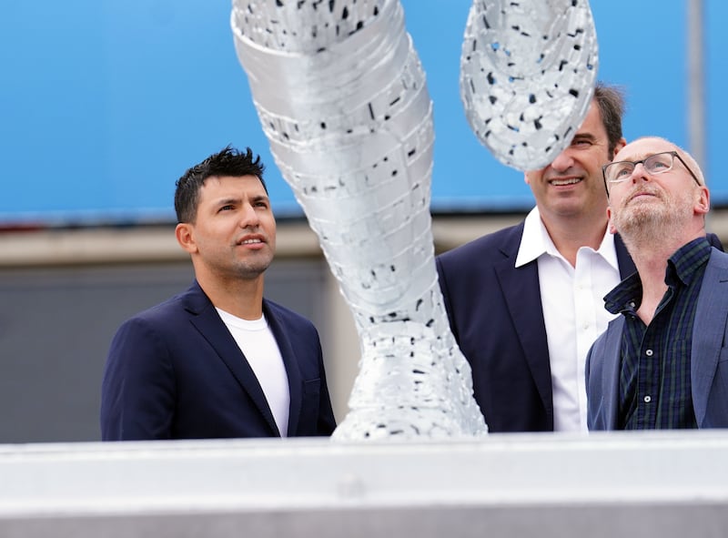 Manchester City's record scorer Sergio Aguero with sculptor Andy Scott during his statue unveiling outside the Etihad Stadium. AP