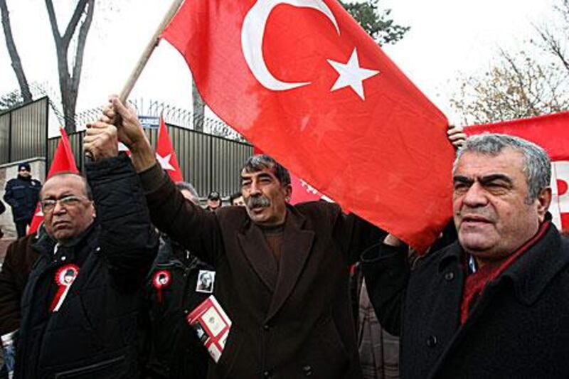 Turkish protesters rally outside the French Embassy in Ankara yesterday after news of the bill emerged.