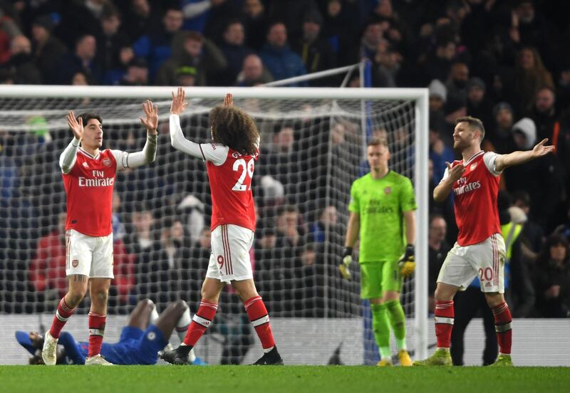 Hector Bellerin and Matteo Guendouzi of Arsenal high five after the final whistle. Getty