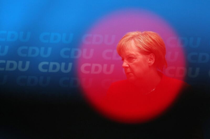 Angela Merkel, Germany's chancellor and leader of the Christian Democratic Union (CDU) party, pauses while speaking during a news conference at the CDU headquarters in Berlin, Germany, on Monday, June 18, 2018. Merkel has accepted a two-week deadline over tougher migration policy set by Interior Minister Horst Seehofer, who leads her Bavarian coalition partner, according to a person familiar with the matter. Photographer: Krisztian Bocsi/Bloomberg