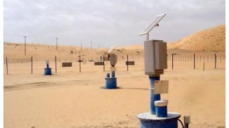 Solar panels power observation wells at a groundwater recharge pilot project in the Liwa region. Courtesy Dornier Consulting