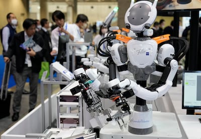 An all-in-one dual -armed robot 'Nextage' at the Kawada Robotics booth, during the International Robot Exhibition in Tokyo. EPA