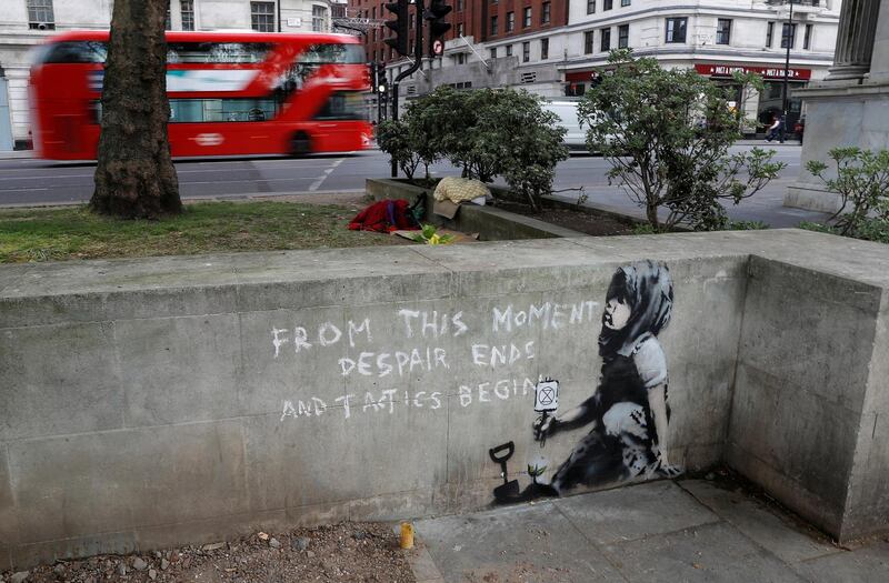 A graffiti believed to have been created by street artist Banksy is seen at Marble Arch. Reuters