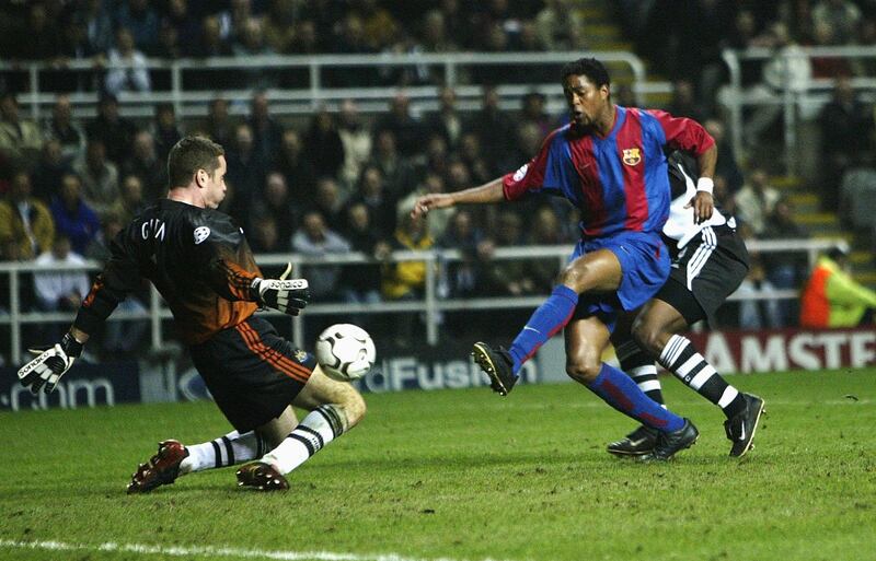 NEWCASTLE - MARCH 19:  Patrick Kluivert of Barcelona scores the first goal during the Newcastle United v FC Barcelona UEFA Champions League Group A match at St James's Park in Newcastle, England on March 19, 2003. (Photo by Alex Livesey/Getty Images)