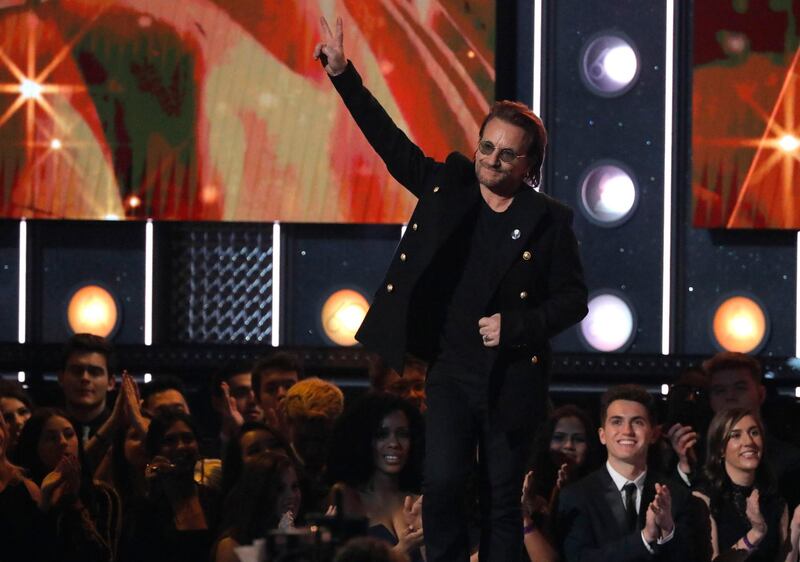 Bono presents the award for album of the year. Lucas Jackson / Reuters