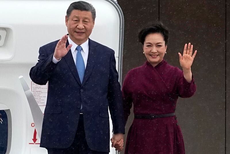 Mr Xi and Ms Peng arrive for the two-day state visit on Sunday. AFP