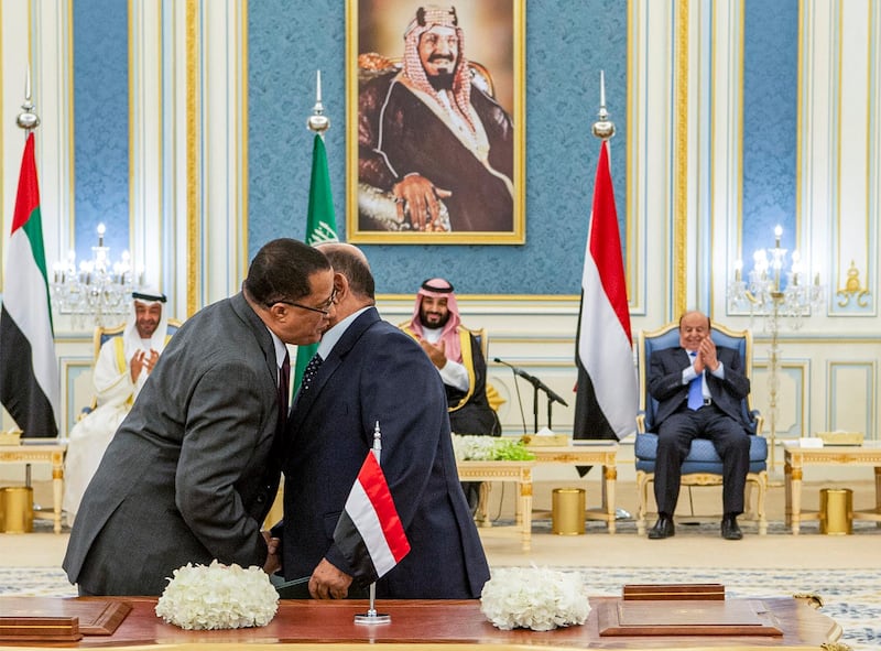 Yemeni Southern Transitional Council member and former Aden Governor Nasser Al Khabji and Yemen's Deputy Prime Minister Salem Al Khanbashi after signing the power-sharing agreement in Riyadh, Saudi Arabia. They were watched by Sheikh Mohamed bin Zayed, Crown Prince of Abu Dhabi and Deputy Supreme Commander of the UAE Armed Forces, Saudi Crown Prince Mohammed bin Salman, and Yemeni President Abdrabu Mansur Hadi AFP