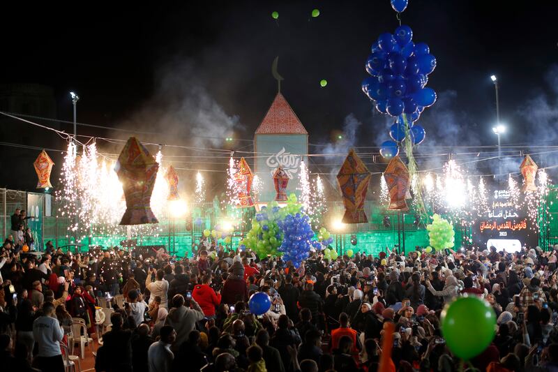 Palestinians celebrate the lighting of Ramadan lanterns in Jerusalem's Old City. EPA