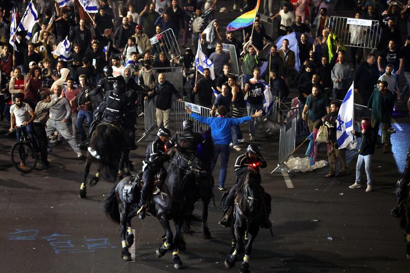 A violent scene during a rally in Tel Aviv. AFP