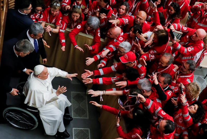 Pope Francis meets Italian Red Cross volunteers at the Vatican. Reuters