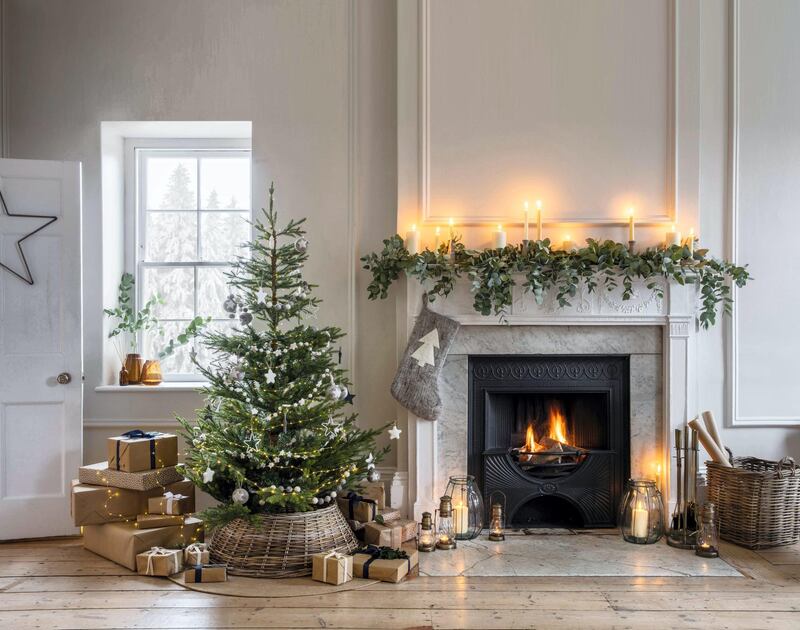 Spare-paper-wrapped gifts, LED fairy lights and cloth or wooden ornaments are some ways to have an eco-friendly Christmas. Photo: Garden Trading