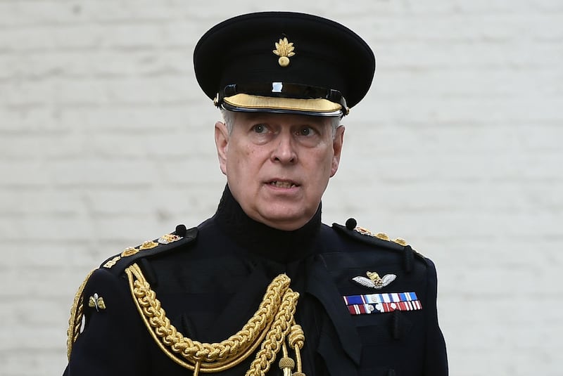 (FILES) In this file photo taken on September 07, 2019 Britain's Prince Andrew, Duke of York, attends a ceremony commemorating the 75th anniversary of the liberation of Bruges, in Bruges.  Queen Elizabeth II's second son, Prince Andrew, on June 8, 2020, denied failing to cooperate with the US Department of Justice (DoJ) in its investigation into the late sex offender Jeffrey Epstein. Claims he had offered "zero cooperation" in the case were untrue, his lawyers said, adding: "The Duke of York has on at least three occasions this year offered his assistance as a witness to the DoJ." / AFP / JOHN THYS

