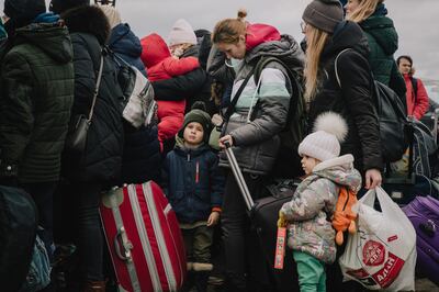 Mothers with their children at the Palanca border crossing into Moldova, March 6 2022