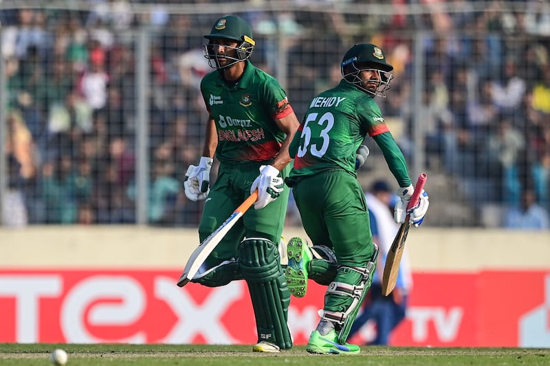 Bangladesh's Mahmudullah Riyad and Mehidy Hasan Miraz run between the wickets. AFP