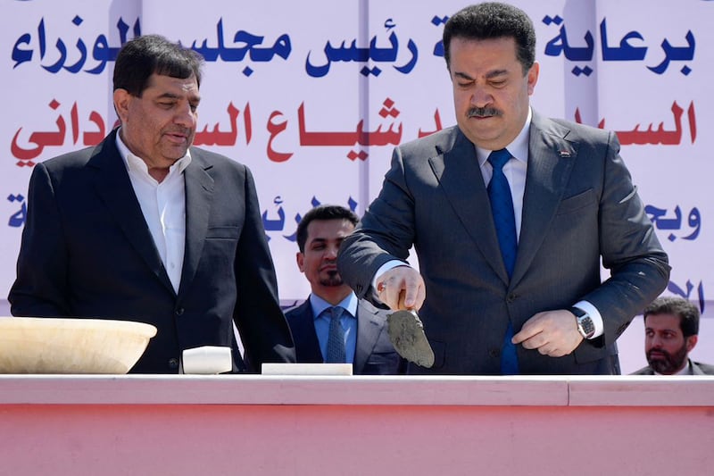 Iraq Prime Minister Mohammed Shia Al Sudani and Iran's Vice President Mohammad Mokhber lay the foundation stone for the railway connection project at the Shalamcheh border crossing. Photo: Iraq's Prime Minister's Media Office