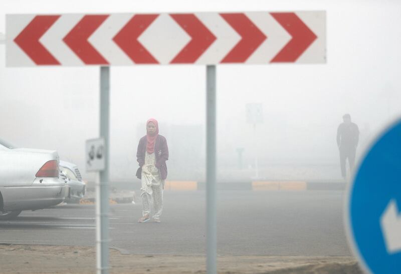 Abu Dhabi, United Arab Emirates, December 30, 2019.  
Commuters on a foggy morning at Khalifa City, Abu Dhabi.
Victor Besa / The National
Section:   NA 
Reporter: