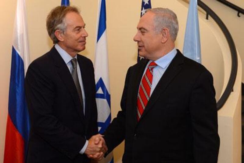 Tony Blair, left, meets Israel's prime minister Benjamin Netanyahu in Jerusalem last week. Kobi Gideon / EPA