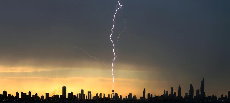 Lightning strikes the liberation tower in Kuwait City during a thunder storm.  AFP