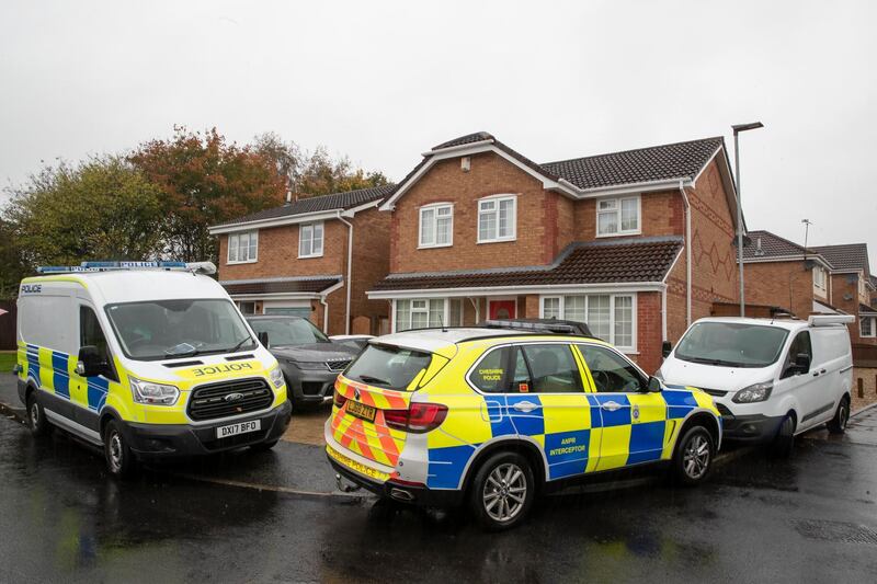 Police outside the house of Joanna and Thomas Maher in Warrington, who have said they had sold the Scania lorry cab, which is registered in Bulgaria, to a company in Ireland, after 39 migrants were found dead in a refrigerated trailer in Grays in the early hours of Wednesday.