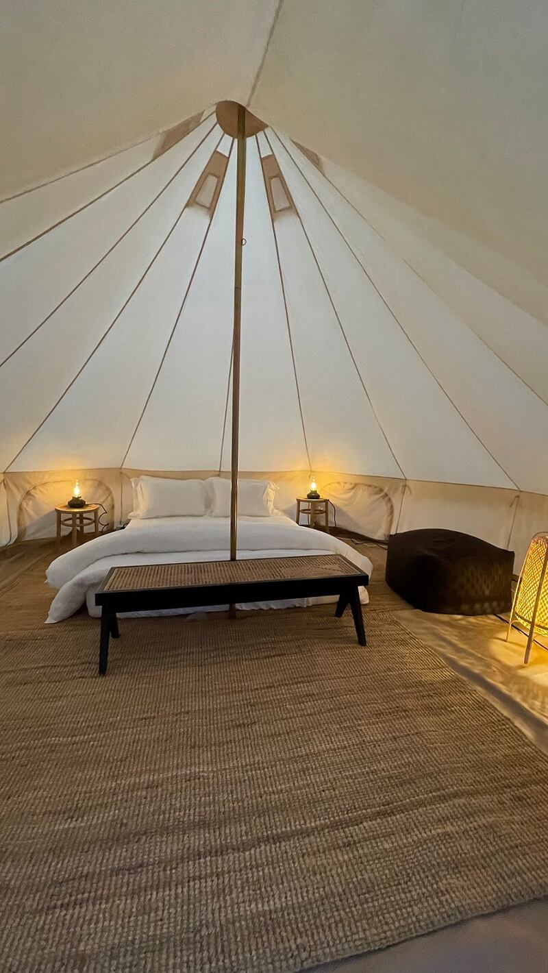 Yurt-style tents are fully equipped with lights and bedding