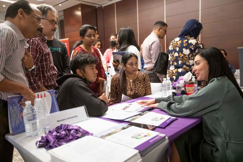 Pupils and families at the Canadian Education Fair in Dubai.  Ruel Pableo for The National