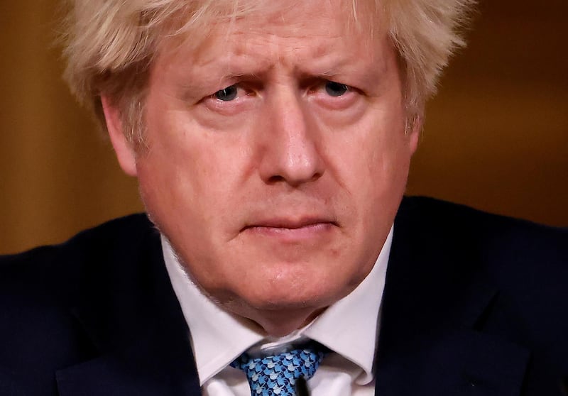 Britain's Prime Minister Boris Johnson attends a virtual news conference on the COVID-19 pandemic, at 10 Downing Street in London, Britain January 7, 2021. Tolga Akmen/Pool via REUTERS