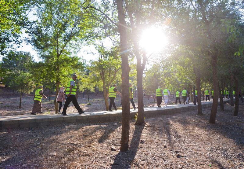 Participants walk through King Hussein Park.