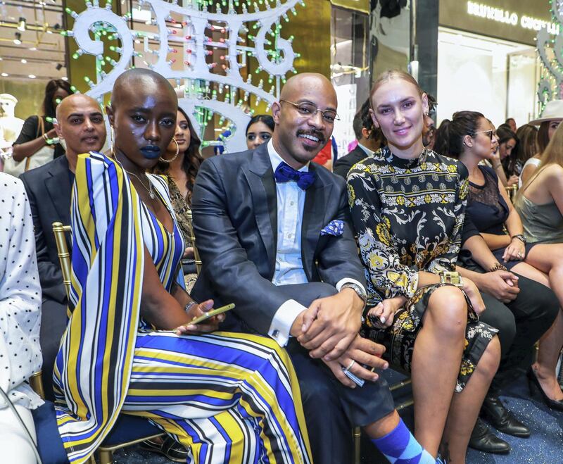 Dubai, U.A.E., October 7,  2018. Dolce & Gabbana Fashion Show, Dubai Mall.-- Winnie Carine, David Charvalho and Mango Dedova.
Victor Besa / The National
Section:  Fashion
Reporter:  Selina Denman