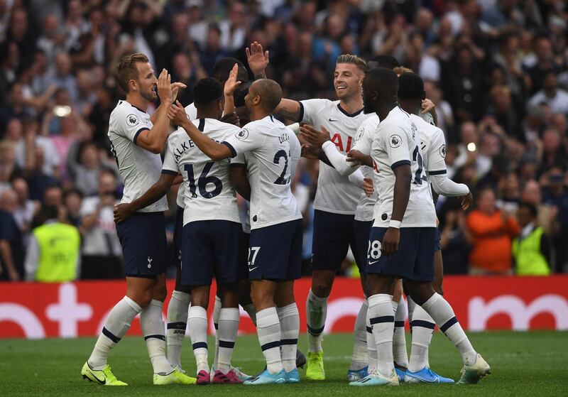 epa07766783 Tottenham Hotspur's players reacts after Harry Kane (L) scores the 3-1 goal during the English Premier League soccer match between Tottenham Hotspur and Aston Villa at the Tottenham Hotspur Stadium in London, Britain, 10 August 2019.  EPA/NEIL HALL EDITORIAL USE ONLY. No use with unauthorized audio, video, data, fixture lists, club/league logos or 'live' services. Online in-match use limited to 120 images, no video emulation. No use in betting, games or single club/league/player publications