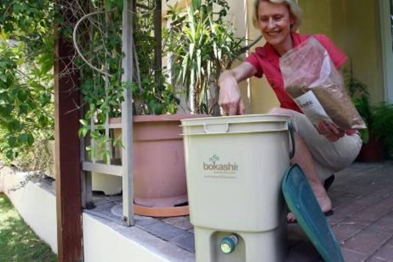 Dubai, United Arab Emirates- August 01, 2011:    Janine Shearda resident in Dubai uses the   Bokashi Composting  Bins using  a selected group of Micro Organisms to Anaerobically Ferment Organic waste at her villa  in Dubai .  ( Satish Kumar / The National ) 