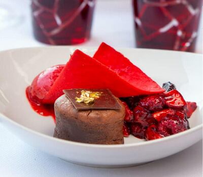 Semi-cooked bitter chocolate, red fruits coated with a coulis, strawberry sorbet at Fouquet's Abu Dhabi