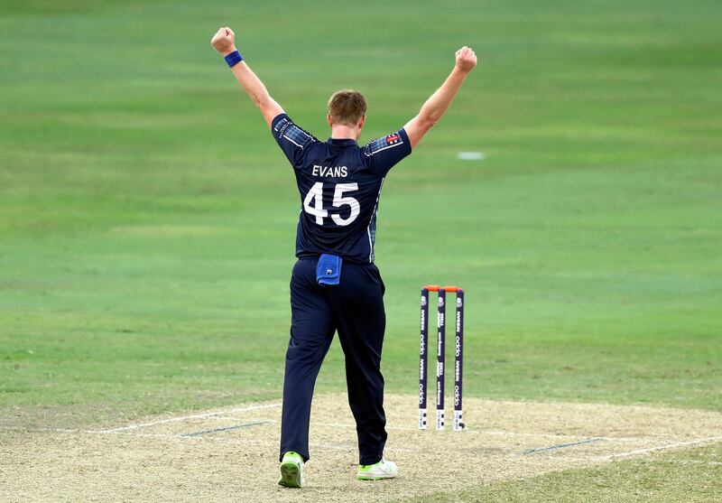 Dubai, United Arab Emirates - October 30, 2019: Scotland's Alasdair Evans takes the wicket of UAE's Junaid Siddique during the game between the UAE and Scotland in the World Cup Qualifier in the Dubai International Cricket Stadium. Wednesday the 30th of October 2019. Sports City, Dubai. Chris Whiteoak / The National