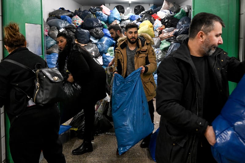 Members of the Turkish community in Berlin gather humanitarian aid. EPA