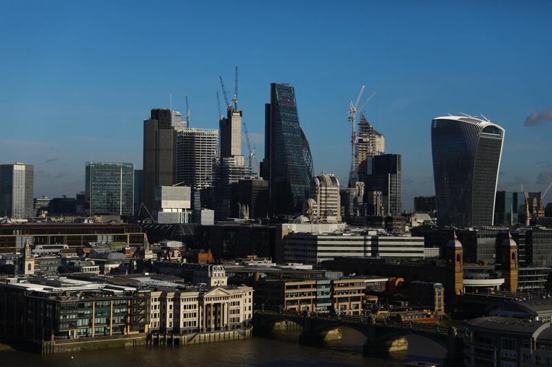 epa06453828 The sun shines on a view of the the City of London in London, Britain, 19 January 2018.  EPA/NEIL HALL