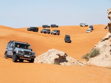 The Ineos Grenadier negotiates a route around desert rocks in the UAE. Photo: Ineos