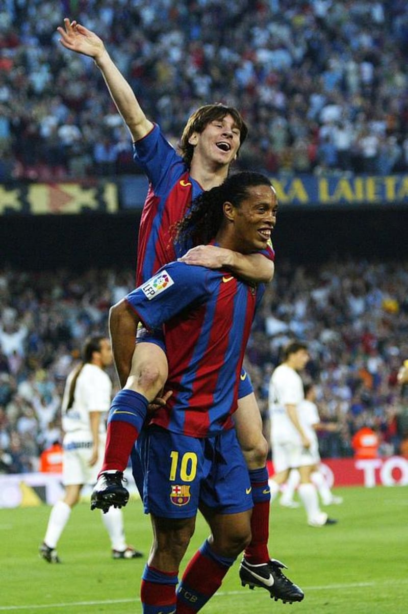 As a teenager, Messi was shy and timid but Ronaldinho made him feel welcome in his early days. Lluis Gene / AFP
