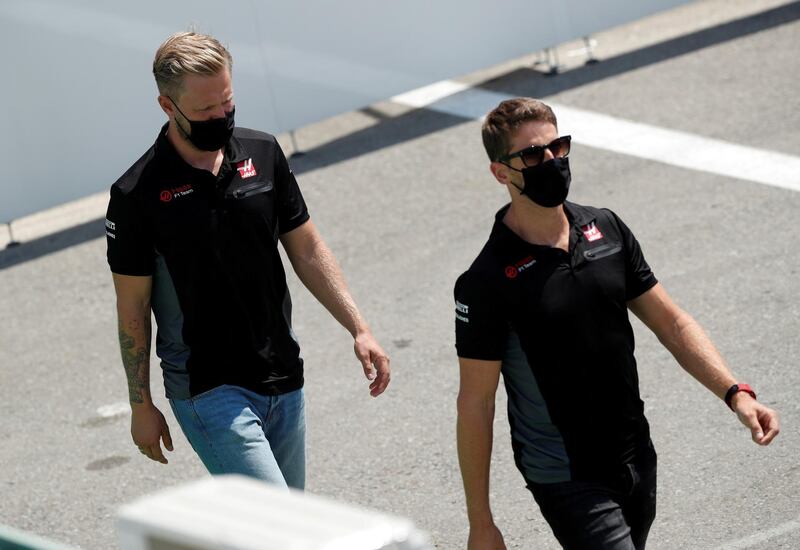 FILE PHOTO: Haas' Kevin Magnussen and Haas' Romain Grosjean pictured ahead of the Spanish Grand Prix, August 13, 2020  REUTERS/Albert Gea/File Photo