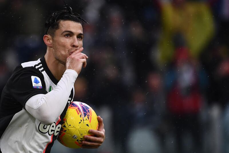 Juventus' Portuguese forward Cristiano Ronaldo celebrates after scoring the equalising goal in a 2-2 draw with Sassuolo at the Allianz Stadium in Turin.  AFP