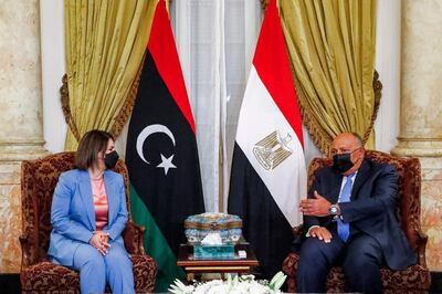 Egypt's Foreign Minister Sameh Shoukri (R) meets with his Libyan counterpart Najla al-Mangoush (L) in the capital Cairo on June 19, 2021. / AFP / Khaled DESOUKI
