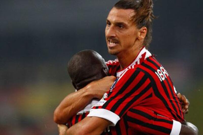 Clarence Seedorf, left, set-up the equalising goal for AC Milan that was scored by Zlatan Ibrahimovic.