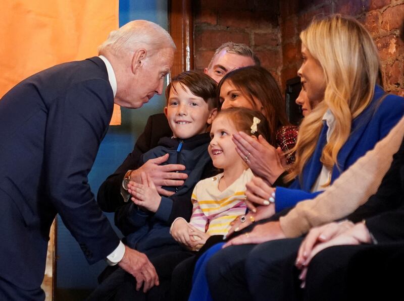 President Biden interacts with children in Dundalk. Reuters
