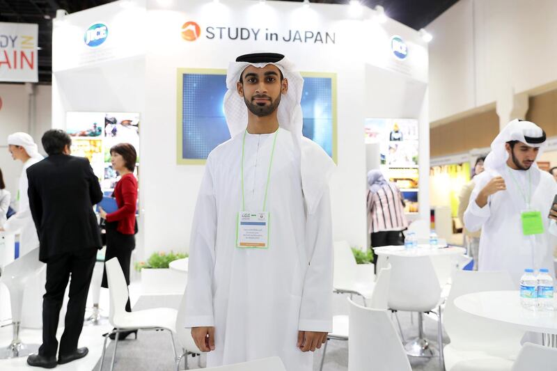 ABU DHABI , UNITED ARAB EMIRATES ,  October 31 , 2018 :- Easa Alshemsi at the Japan stand during the Najah Education Fair held at Abu Dhabi National Exhibition Centre in Abu Dhabi.  ( Pawan Singh / The National )  For News. Story by Anam