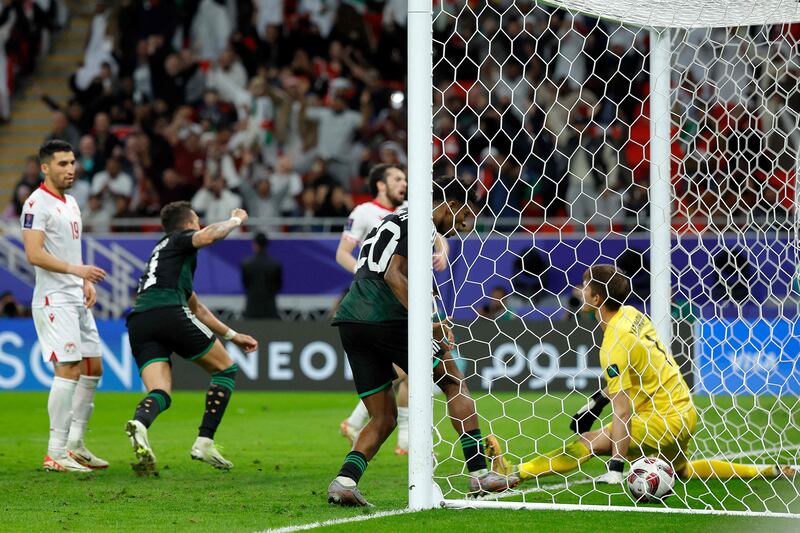 The UAE's players celebrate Khalifa Al Hammadi's goal. AFP