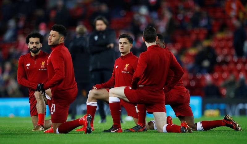 Soccer Football - Premier League - Liverpool vs Swansea City - Anfield, Liverpool, Britain - December 26, 2017   Liverpool's Philippe Coutinho and Mohamed Salah during the warm up before the match     REUTERS/Phil Noble    EDITORIAL USE ONLY. No use with unauthorized audio, video, data, fixture lists, club/league logos or "live" services. Online in-match use limited to 75 images, no video emulation. No use in betting, games or single club/league/player publications.  Please contact your account representative for further details.