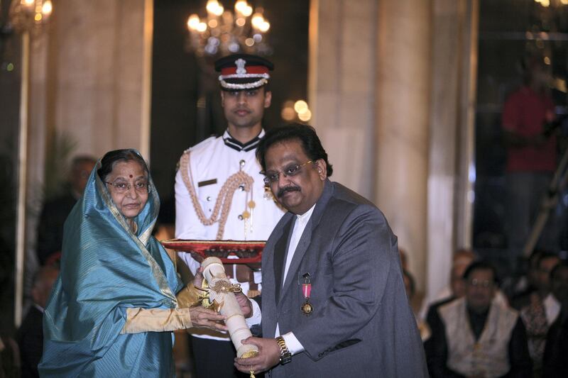 NEW DELHI, INDIA - MARCH 24: President Pratibha Patil presents Padma Bhushan to singer SP Balasubrahmanyam during Padma Awards 2011 ceremony at the Rashtrapati Bhavan in New Delhi on Thursday. (Photo by Shekhar Yadav/The India Today Group via Getty Images)